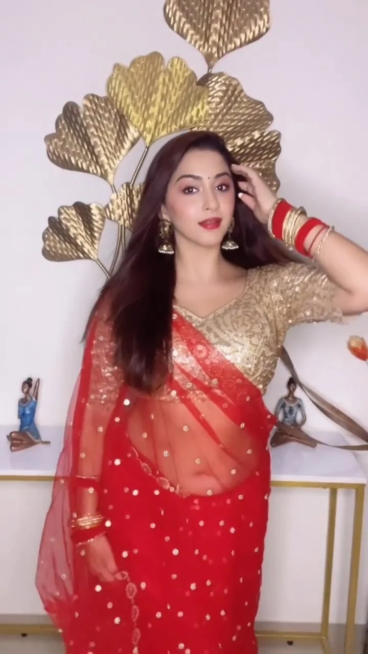 esshanya maheshwari navel red sheer saree curvy indian actress