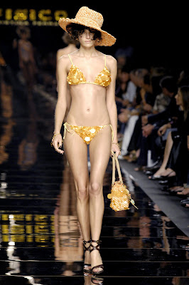 Valentina Zeliaeva on the runway in a bikini