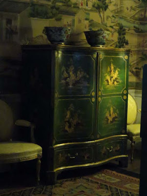 gold and green cabinet