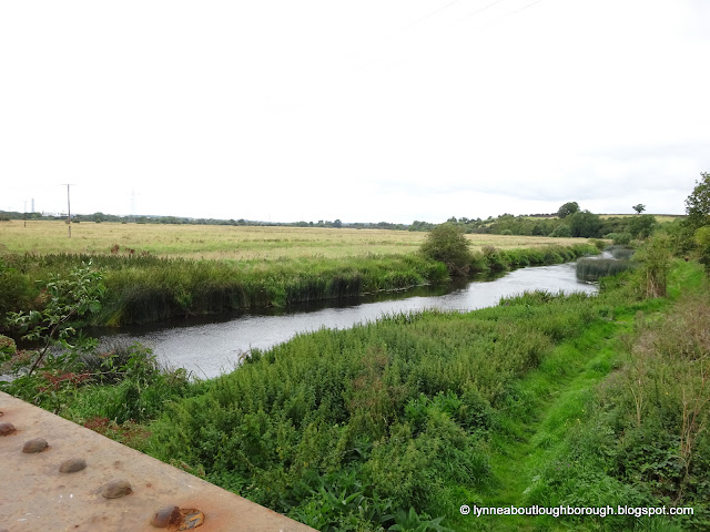 Lammas Meadow to the left, River Soar across the middle, taken from the road bridge, left of foreground, on Meadow Lane