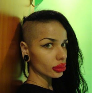 Woman with the world's biggest lips:Kristina Rei