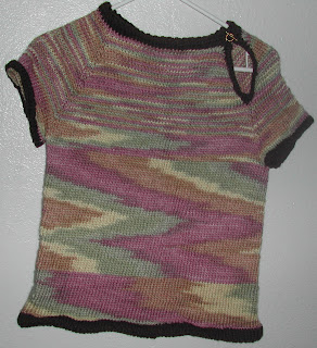 This short sleeve sweater is still for sale, a great way to keep warm when you don't want long sleeves.