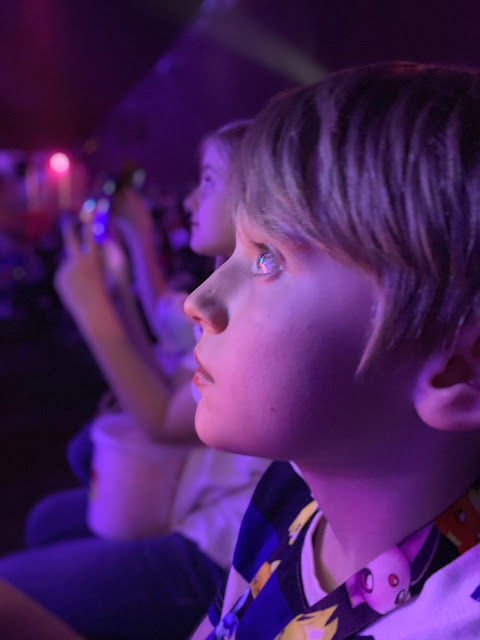 Boy watches circus act at Zippos