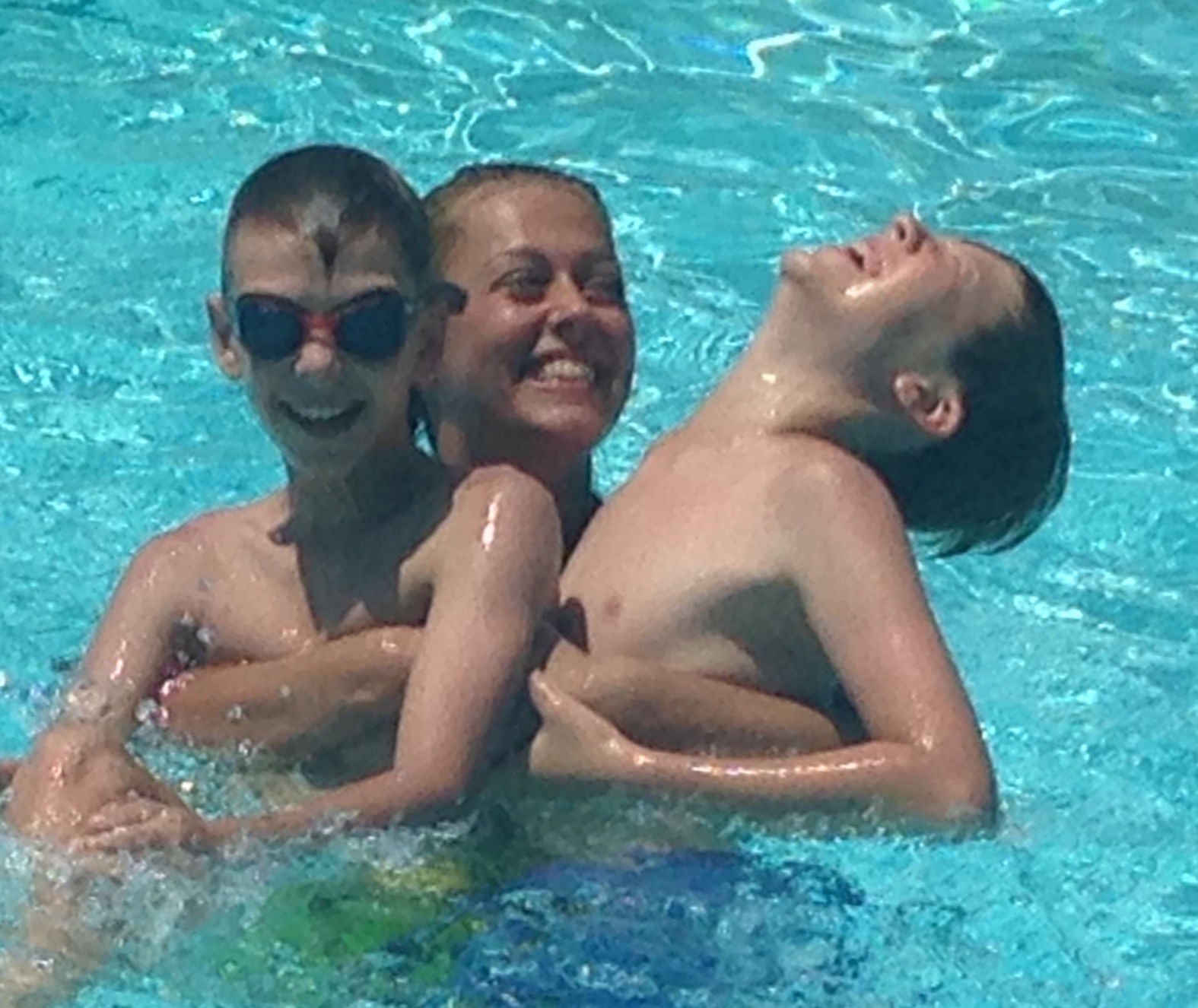 Caterina and the boys playing in the pool