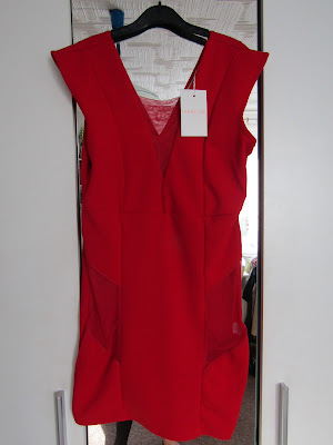 https://femmeluxefinery.co.uk/products/red-mesh-panel-v-neck-bodycon-mini-dress-tammy