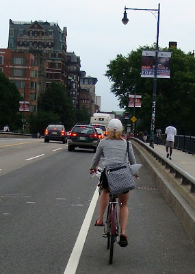 grey summer jacket on a bike