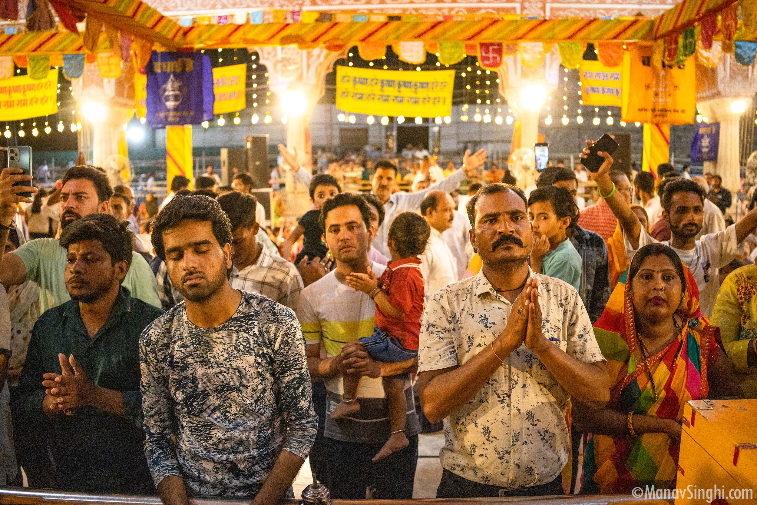 Devotees Praying at Shri Krishna Janmashtami Mahotsav, Govind Devji Temple, Jaipur.