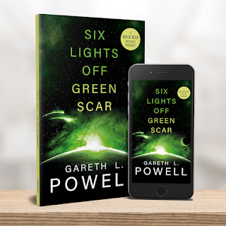 Cover for book "Six Lights Over Green Scar" by Gareth Powell. The cover is seen both on a physical book and on a phone screen. We are above a planet, rising over the horizon ahead is an intense green light. All around is the darkness of space.