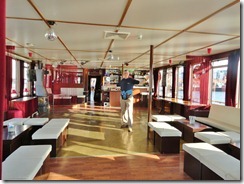 Edward inside the bar on the Hostel Boat