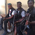 SARS Operatives In Mufti Come Under Fire After Posing With Their Rifles