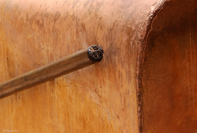 A Minimalist Photograph of the Wooden Side Rail of a Staircase at Amer Fort - Jaipur