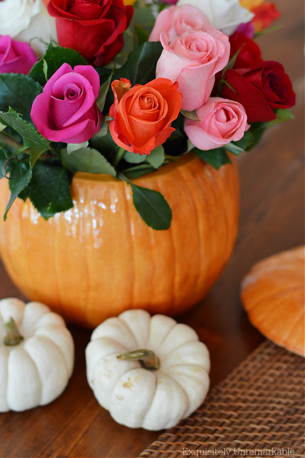 Multicolored Roses In A Ceramic Pumpkin Multicolored Roses In A Ceramic Pumpkin