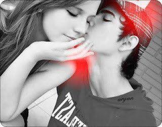 emo boy kissing his girlfriend