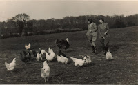 Landgirls feeding tablescraps to pastured poultry 