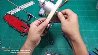 membuat chainsaw mini dari dinamo 12 volt