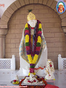 On the Occasion of New Year 2012, Sai Baba was given Sheerabishek followed .