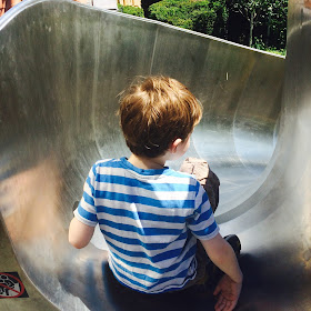 Autistic David on a slide