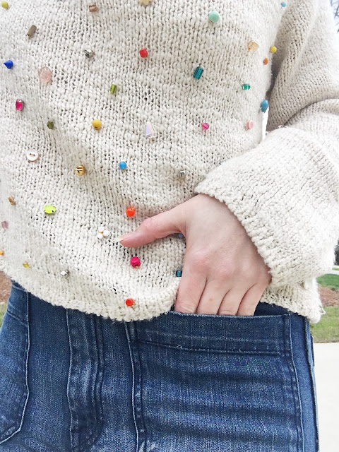 Refashion a thrifted sweater with beaded embellishments.