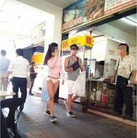 Hot topic: Picture of the woman walking in bikini bottom in Kota Kinabalu city centre that went viral on social media.