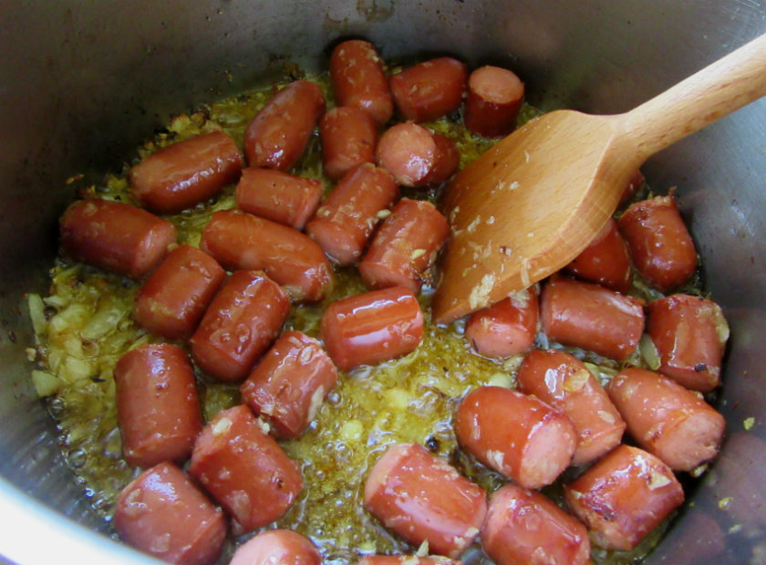 Stir in sausage chunks and sauté