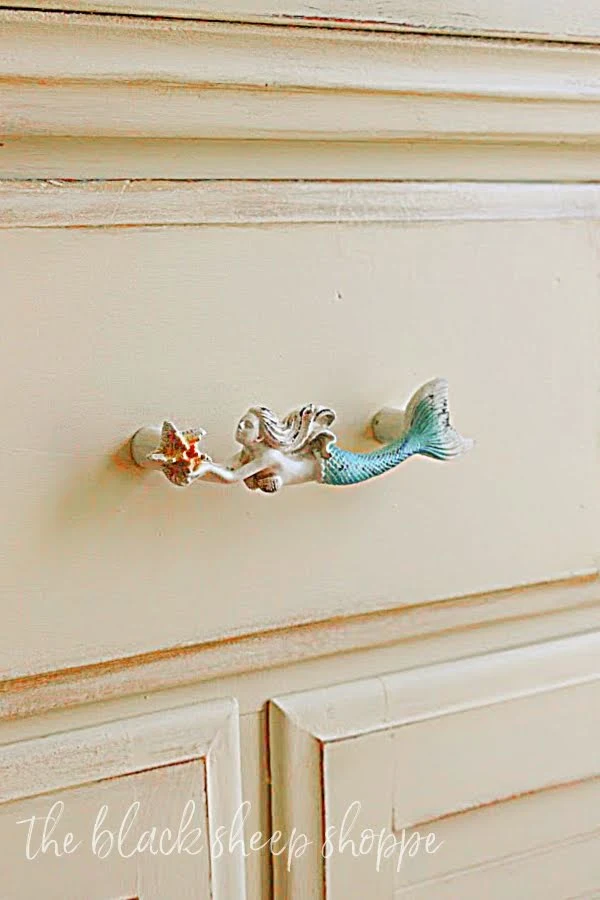 The mermaid drawer pull is the perfect finishing touch.