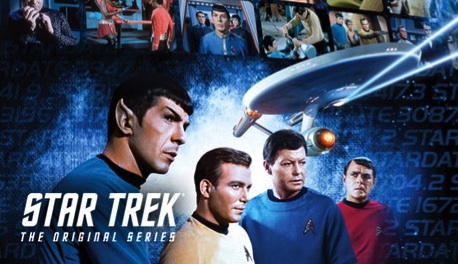 Promo image of Spock, Kirk, Bones, and Scotty with the Enterprise above them