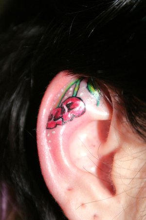 Skull Tattoo Behind Ear