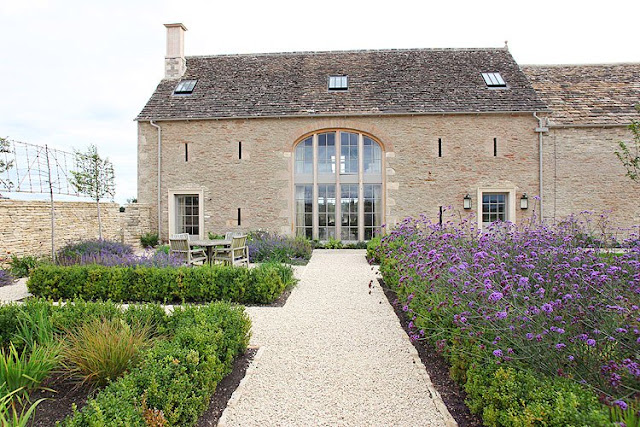 exterior of British Barn conversion with garden