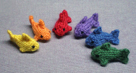 tiny fish magnets in the colours of the rainbow