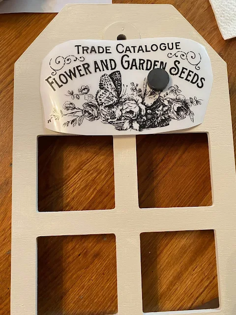 Photo of decor transfer on painted tag photo frame