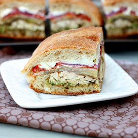 Chicken and Vegetable Pressed Sandwiches with Pesto and Goat Cheese