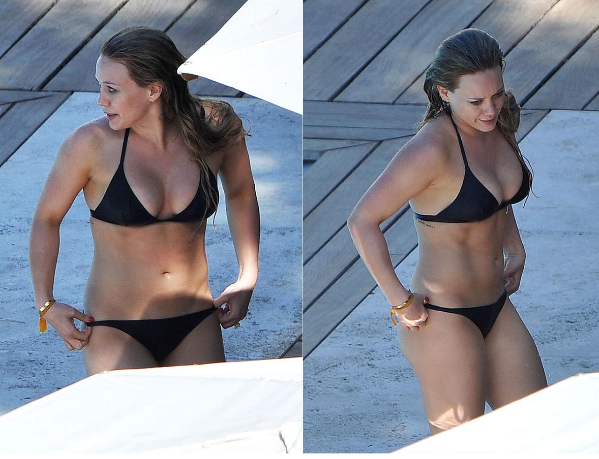 Hilary Duff poses for pictures on the rocks in Capri