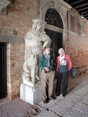 Dane with Tudy Sammartini in the carriageway of her family's home on the Grand Canal