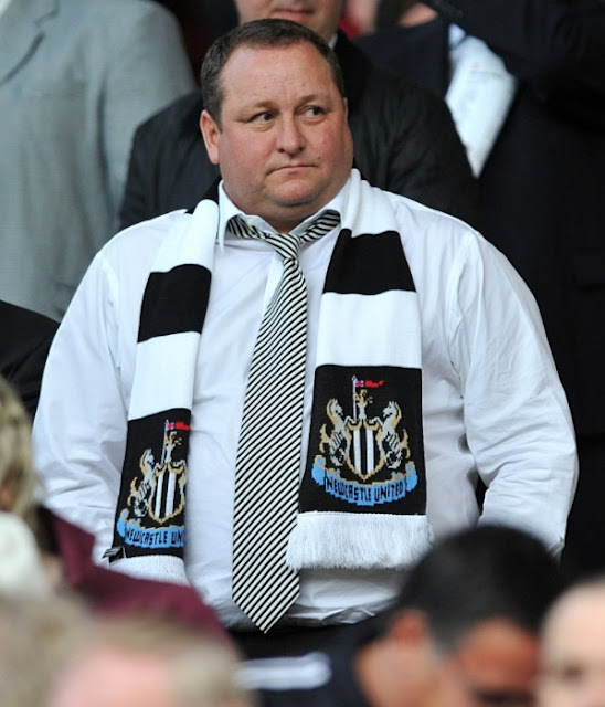 Mike Ashley watching Newcastle matches from the stands with the fans with a club scarf