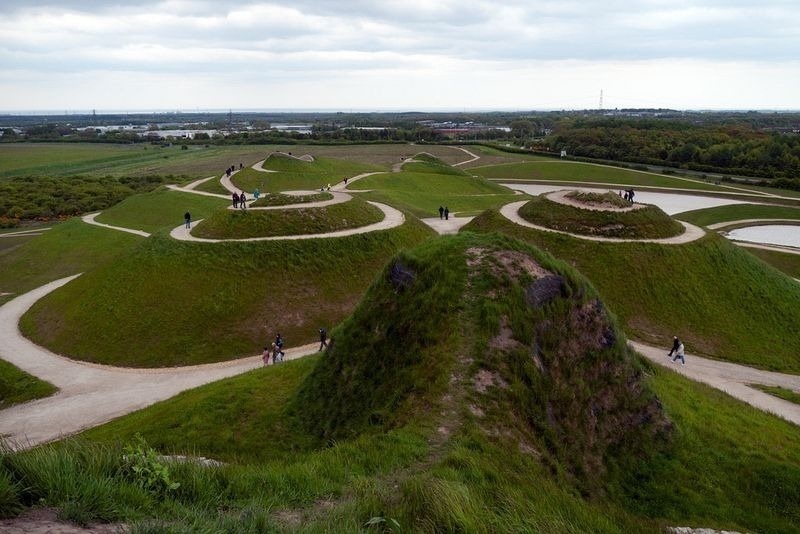 She's made from of 1.5 million tons of rock, clay, and soil, all discarded from the mine. - An Ariel View Of These Mysterious Lines Reveals A Naughty Secret.