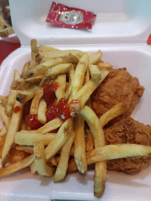 " Fries and chicken from Frango Assado in Panama at the Tocumen international airport"