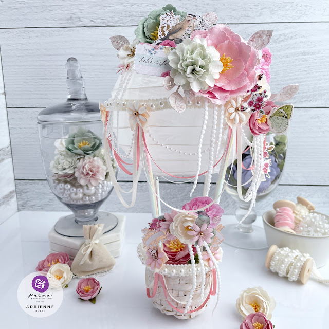 Hot Air Balloon party decor created with: Prima Marketing avec amour ephemera, tags and tickets, paper flowers, paper; Spellbinders autumn leaves die; Amazon ribbon, trim, paper lantern, baskets, paper straws, pearls, bows