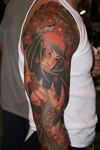 2011 Arm Sleeve Tattoo Designs For Women cross sleeve tattoos tribal arm