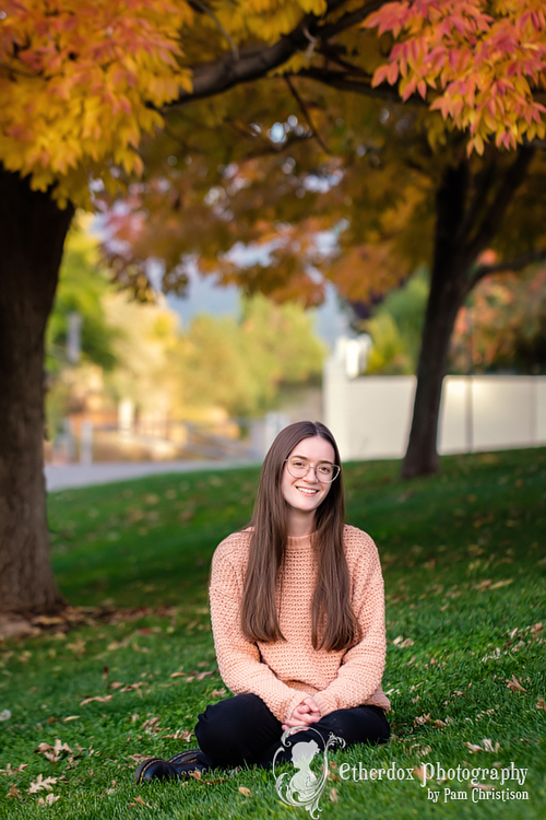 Professional photo of a high school senior girl in a park location Albuquerque