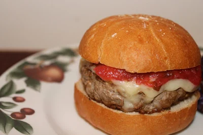 Serving an apple turkey burger with cranberry apple relish.