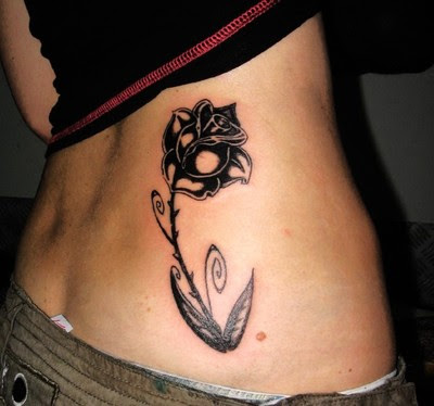 black and white flower tattoos. lack and white flower