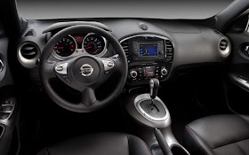 Interior view of 2013 Nissan Juke...black with automatic transmission and navigation