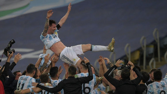 Leo Messi lifted by mates as they win Copa America