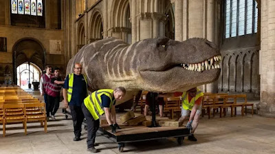 Peterborough cathedral with dinosaur