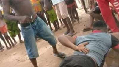 (Photos) Youths Flog Pastor Publicly For Sleeping With A Married Woman