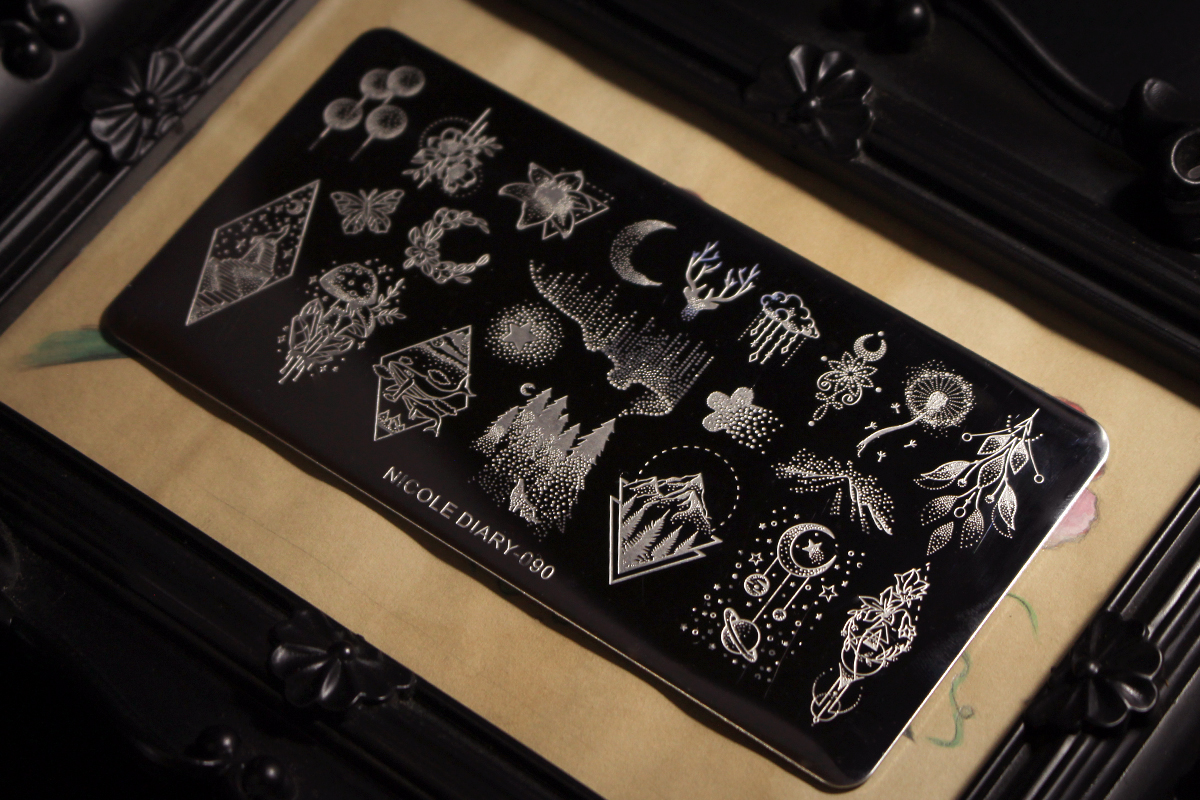 a close-up of stainless steel nail stamping plate for halloween