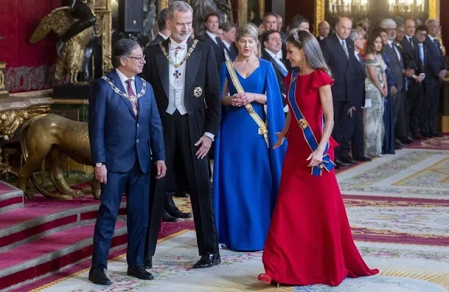 Queen Letizia wore a new red peplum maxi dress. Diamond tiara. Diamond earrings. Colombian First Lady Veronica Alcocer