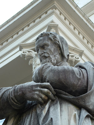 I took this picture in Savannah, Georgia in December, 2003.  Jan, Cory, and I had gone there for New Year's.  This statue was in front of Telfair Museum of Art in Savannah. It's supposed to be a Statue of Michelangelo.  There are also statues of Rembrandt, Rafael, Phidias and Rubens in front of the Museum.  Oh-- and the 'Bird Girl,' best known from the book/movie 'Midnight in the Garden of Good and Evil.'