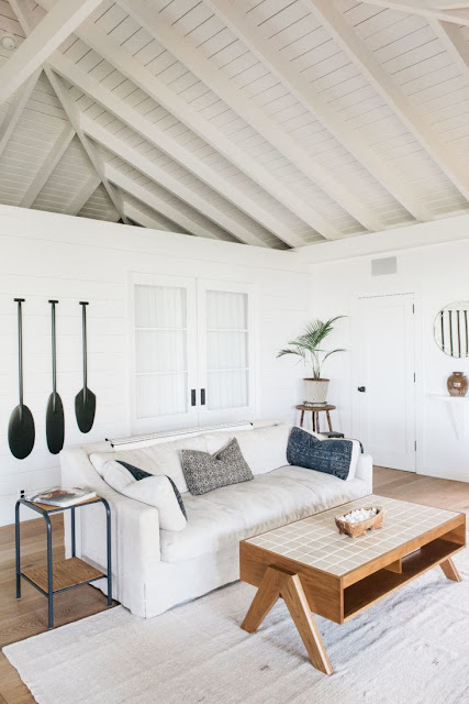 Gorgeous modern white living room in beautiful oceanfront cottage on Maui - found on Hello Lovely Studio