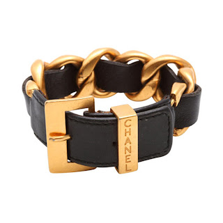 Vintage 1990's gold and black leather Chanel buckle bracelet.